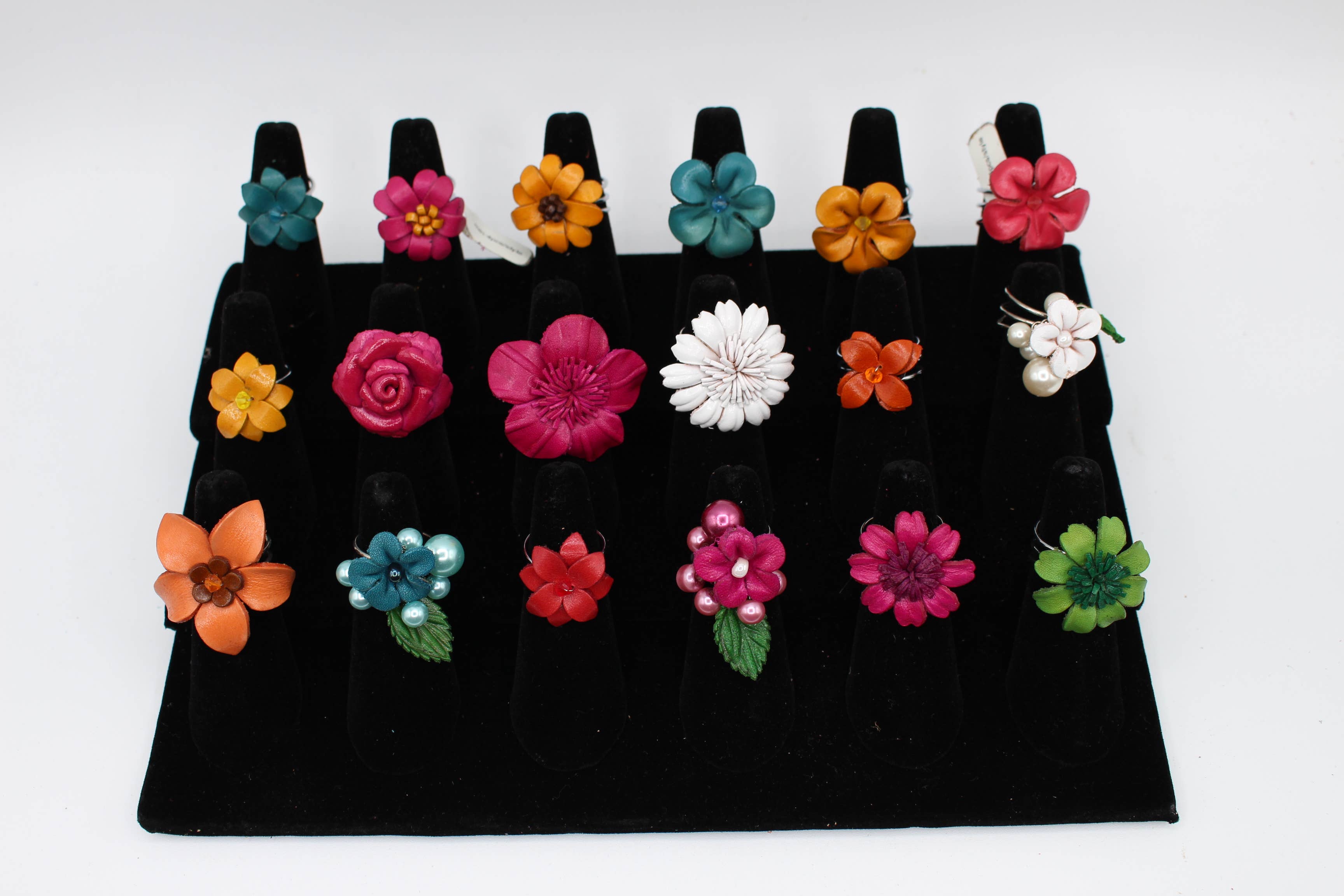 Assorted leather flower ring